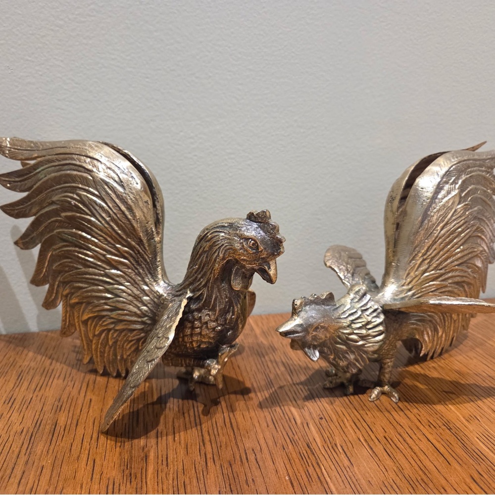 Pair of cast brass fighting roosters